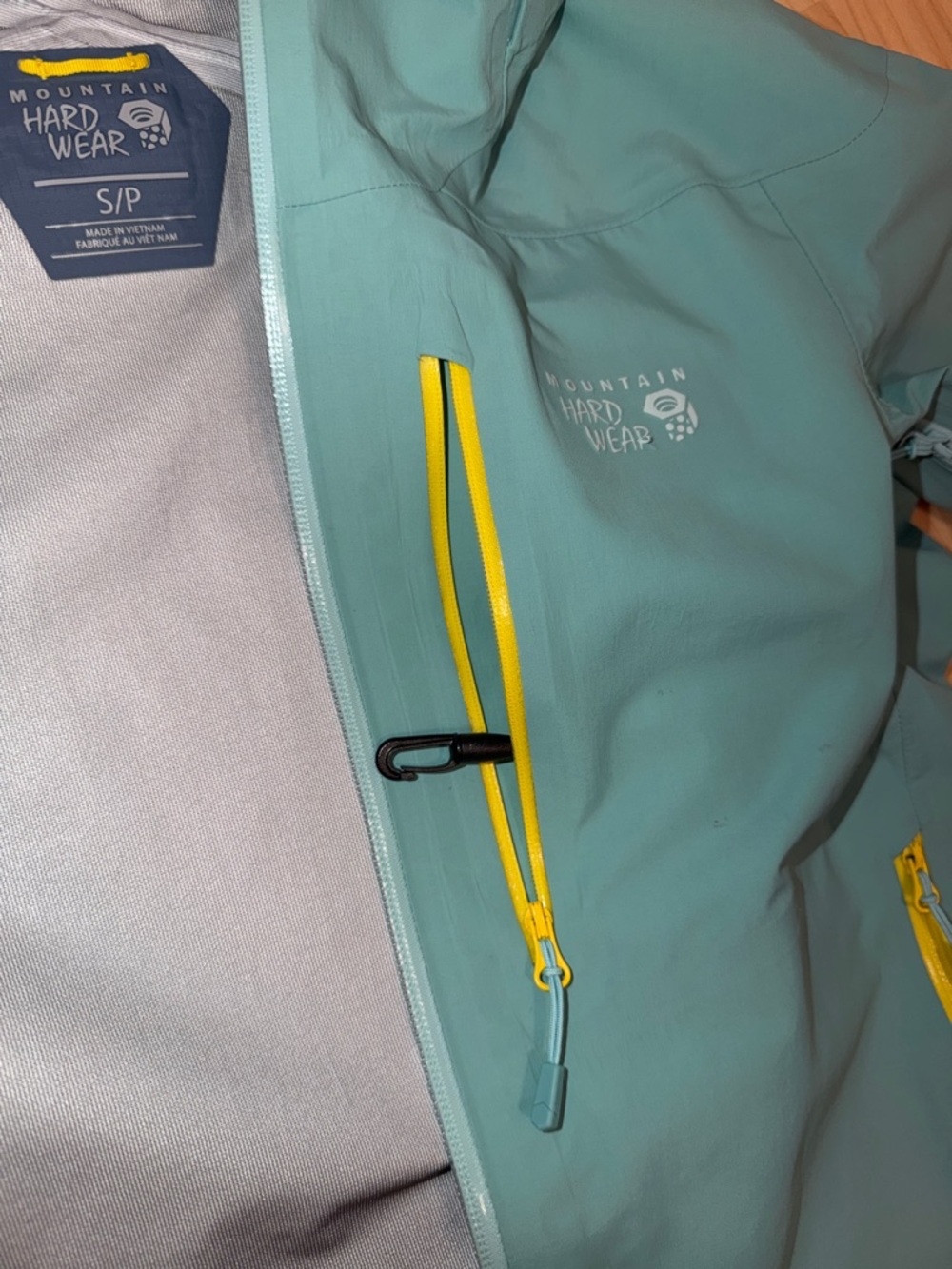 Mountain Hardwear Light Blue Hooded Shell Jacket with Yellow Zips - Picture 8 of 11